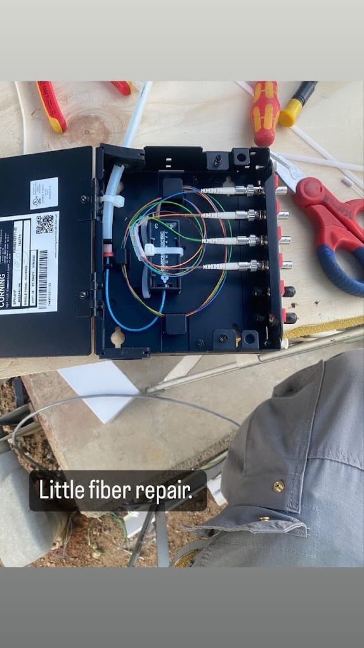 Open fiber enclosure during a commercial fiber repair