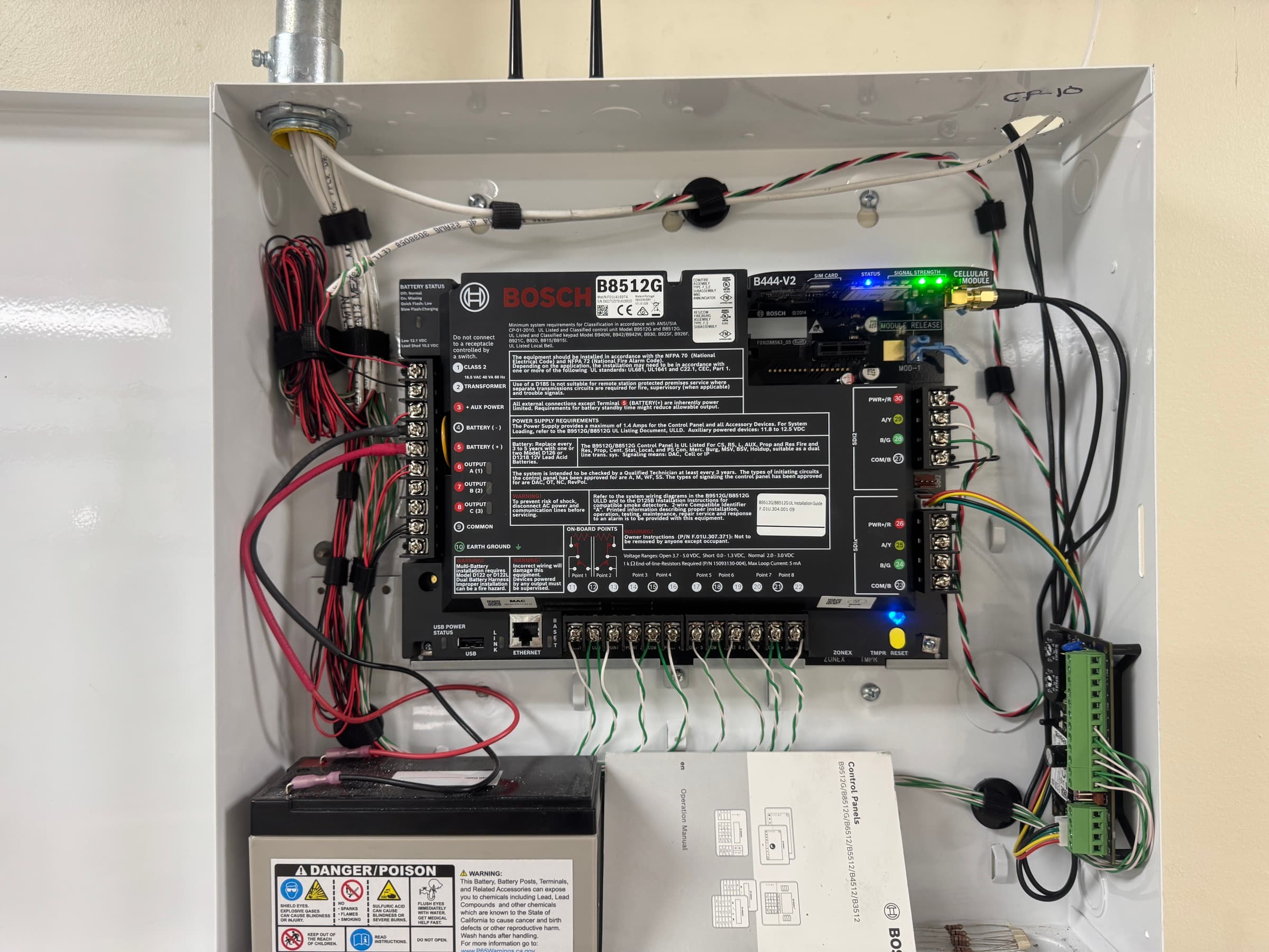 Open commercial alarm control panel with a cellular communications module