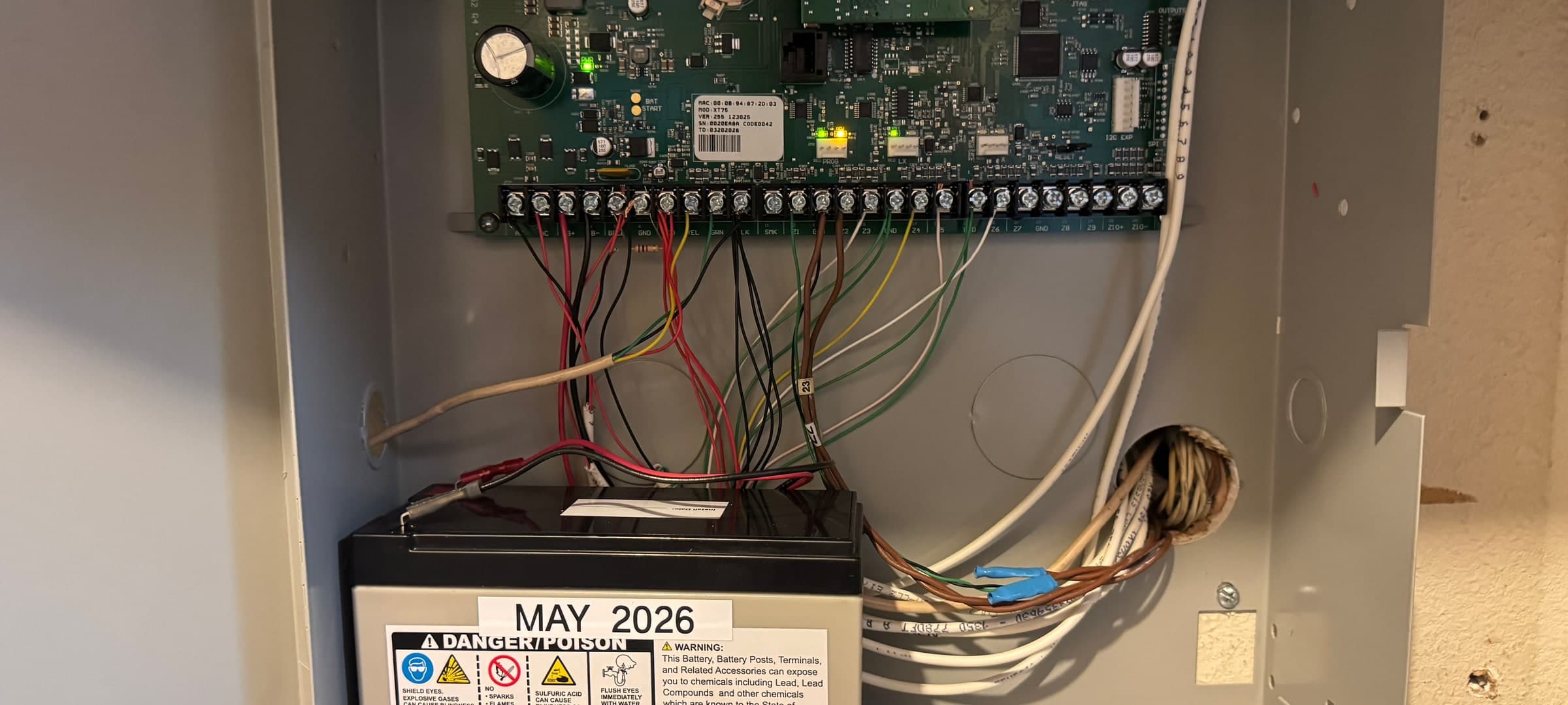 Commercial security alarm control panel with wiring and backup battery