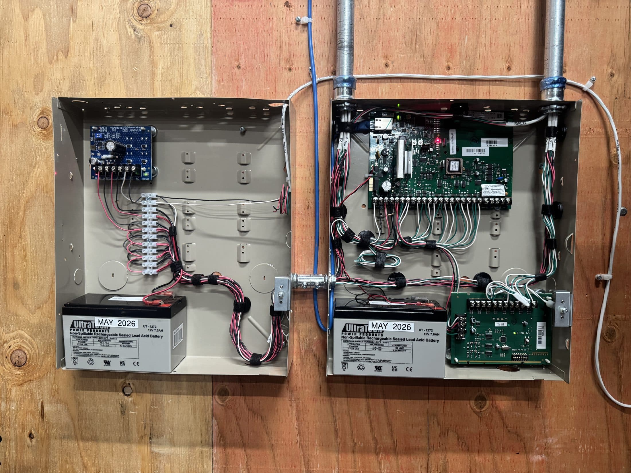 Commercial access control and power panels mounted in a Fresno facility