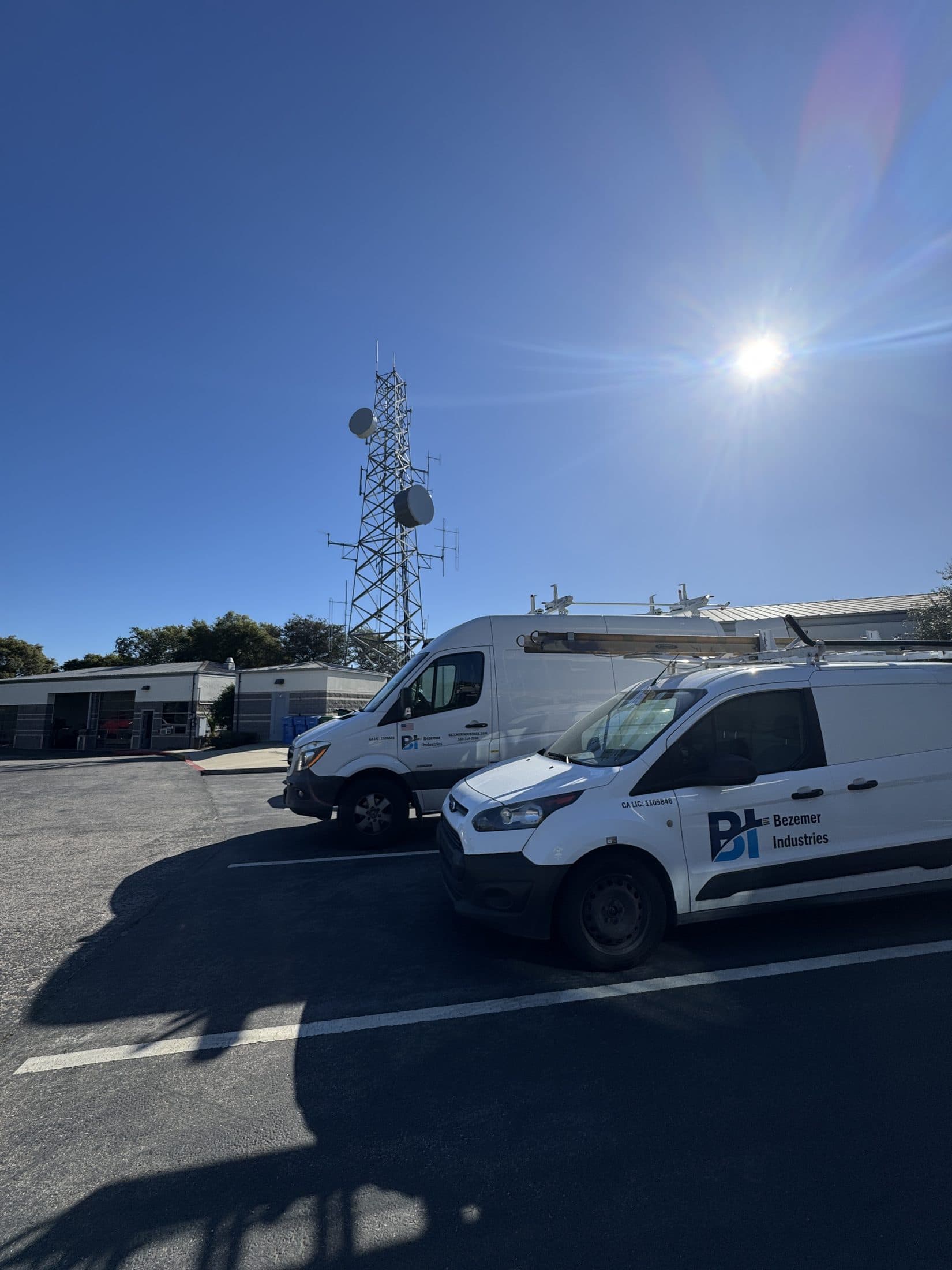 Bezemer Industries service vans at a Central Valley commercial site
