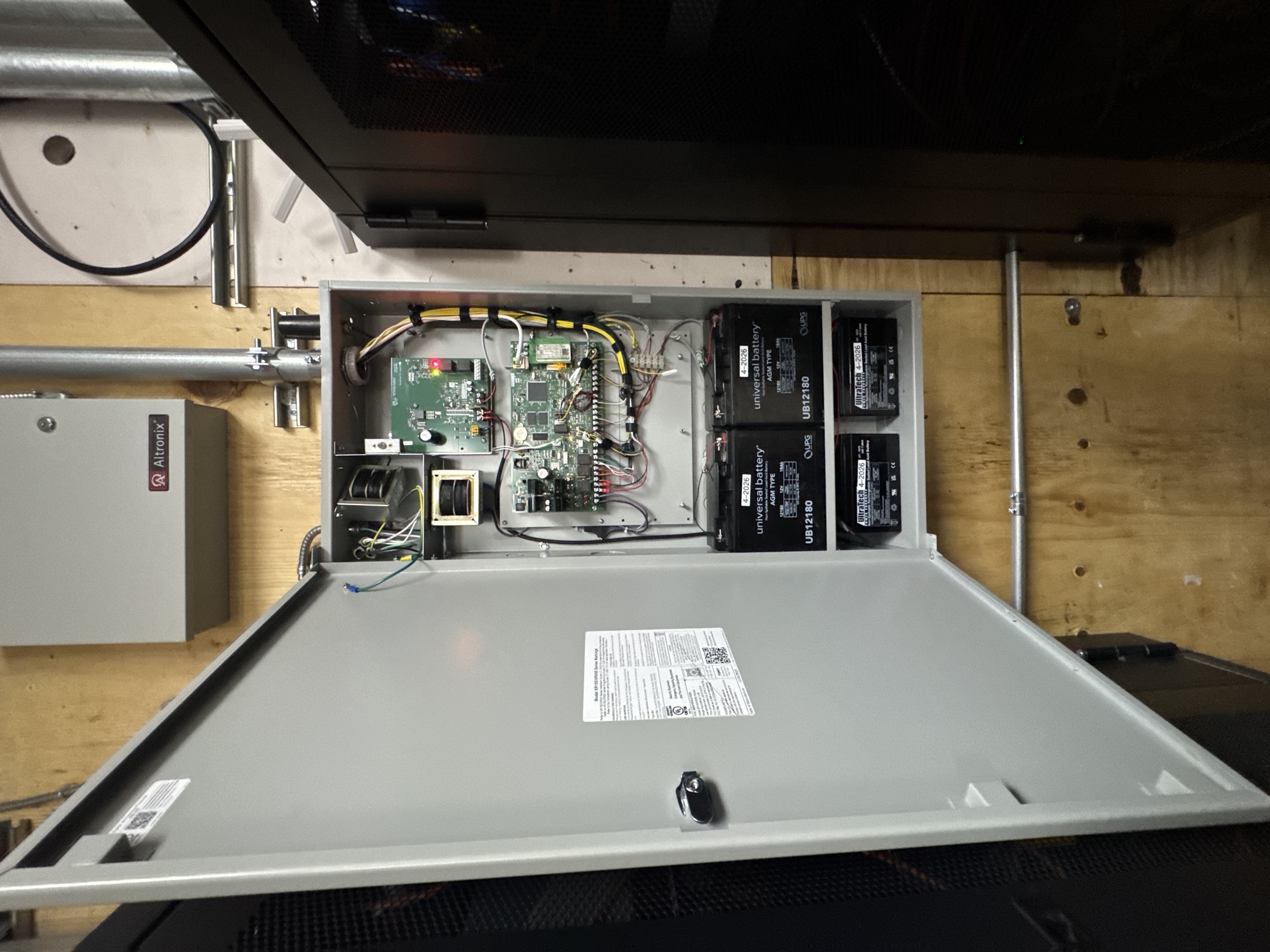 Commercial access control panel with organized wiring and backup power