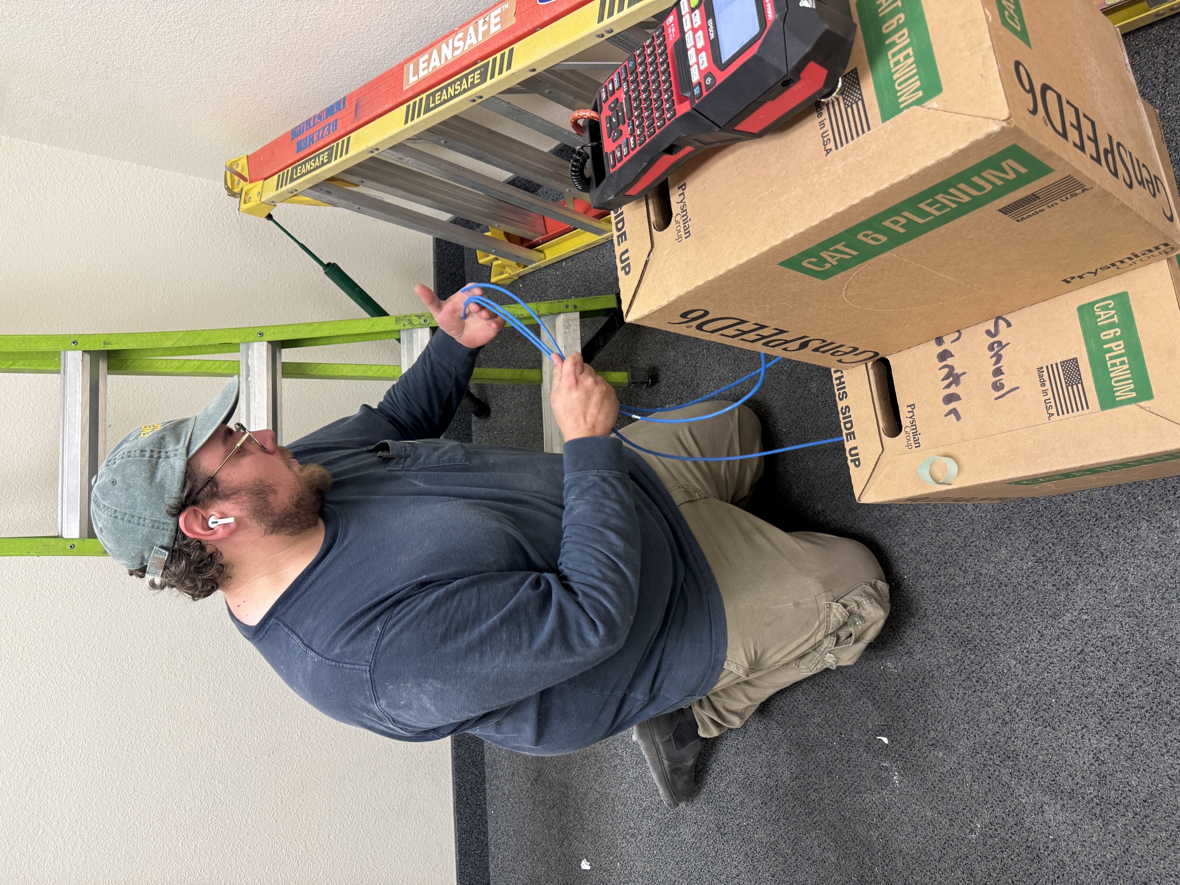 Commercial network cable staging and field tools during low-voltage work